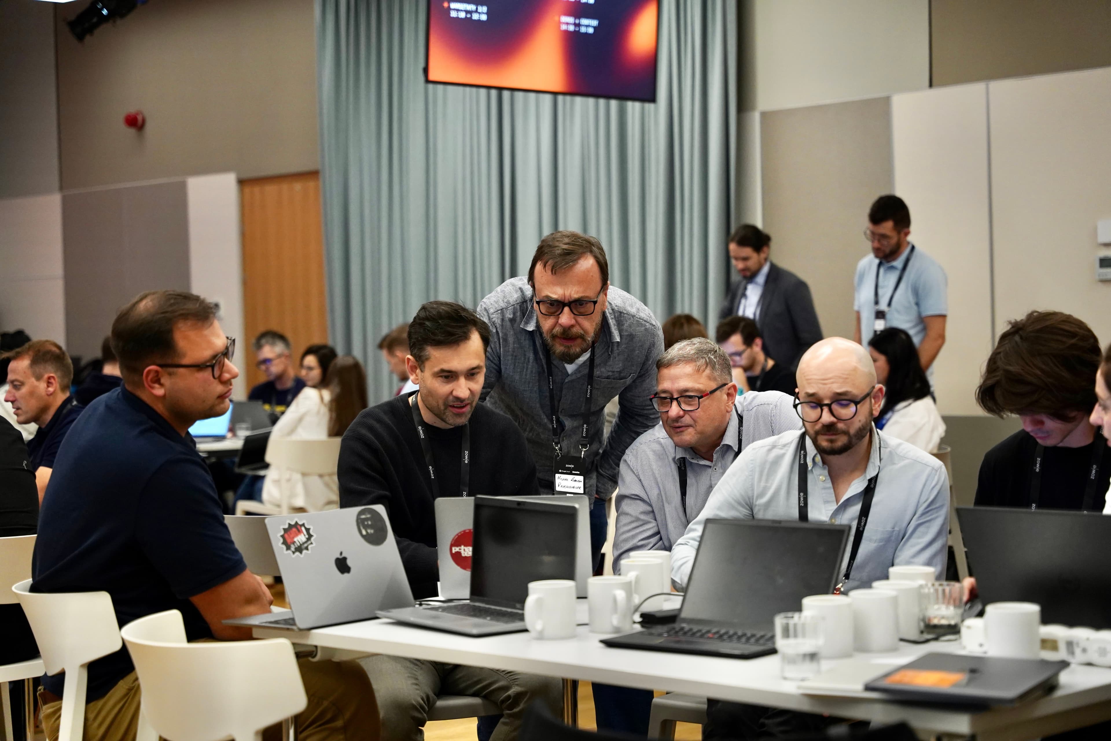 Workshop participants collaborating on AI agent builds